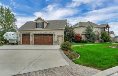 Discover the epitome of luxury living in Saratoga Springs, Utah on Talons Cove Golf Club in Utah - for sale on GolfHomes.com, golf home, golf lot