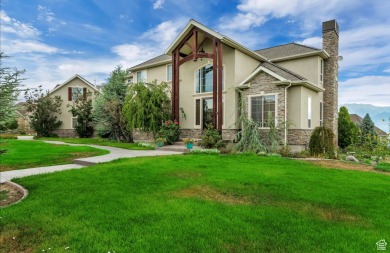 Discover the epitome of luxury living in Saratoga Springs, Utah on Talons Cove Golf Club in Utah - for sale on GolfHomes.com, golf home, golf lot