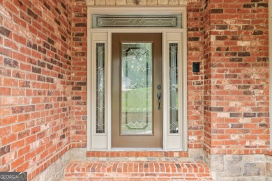 This exquisite Traditional Craftsman home rests near the end of on Traditions of Braselton Golf Club in Georgia - for sale on GolfHomes.com, golf home, golf lot