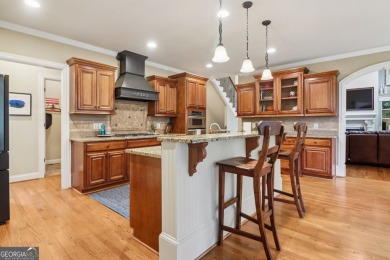 This exquisite Traditional Craftsman home rests near the end of on Traditions of Braselton Golf Club in Georgia - for sale on GolfHomes.com, golf home, golf lot
