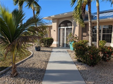 Discover Florida waterfront living at its finest in this on Burnt Store Golf Club in Florida - for sale on GolfHomes.com, golf home, golf lot