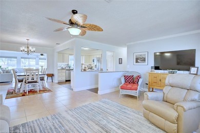 Welcome to this beautifully maintained 3-bedroom, 2-bathroom on River Greens Golf Course in Florida - for sale on GolfHomes.com, golf home, golf lot