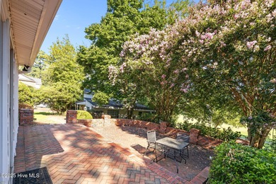 Welcome to this beautiful 4,380 sqft home, perfectly positioned on Greenville Country Club in North Carolina - for sale on GolfHomes.com, golf home, golf lot