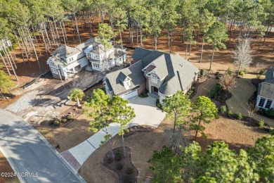 This beautiful custom brick and stone home has numerous upgrades on Tigers Eye Golf Links in North Carolina - for sale on GolfHomes.com, golf home, golf lot
