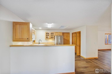 This beautifully updated townhome offers the perfect blend of on Estes Park Golf Course in Colorado - for sale on GolfHomes.com, golf home, golf lot