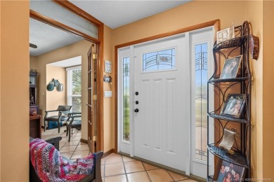 This beautifully maintained home is perfect for the golf lover on Gator Trace Golf and Country Club in Florida - for sale on GolfHomes.com, golf home, golf lot