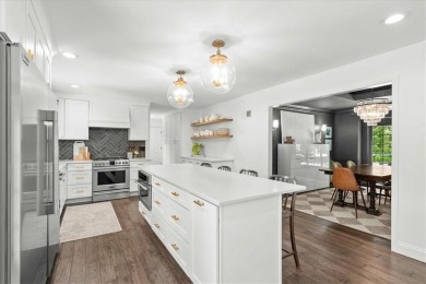 Welcome to this stunning 1.5-story Tudor-style home nestled on on Leawood South Country Club in Kansas - for sale on GolfHomes.com, golf home, golf lot