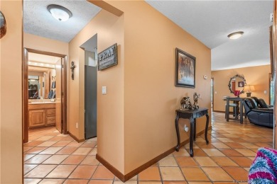 This beautifully maintained home is perfect for the golf lover on Gator Trace Golf and Country Club in Florida - for sale on GolfHomes.com, golf home, golf lot