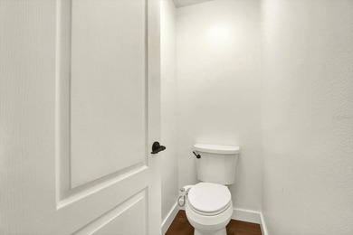 Wake up to panoramic water and fairway views from this fully on Links At Greenfield Plantation in Florida - for sale on GolfHomes.com, golf home, golf lot