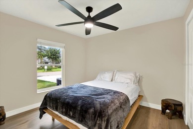 Wake up to panoramic water and fairway views from this fully on Links At Greenfield Plantation in Florida - for sale on GolfHomes.com, golf home, golf lot