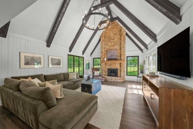 Welcome to this stunning 1.5-story Tudor-style home nestled on on Leawood South Country Club in Kansas - for sale on GolfHomes.com, golf home, golf lot