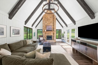 Welcome to this stunning 1.5-story Tudor-style home nestled on on Leawood South Country Club in Kansas - for sale on GolfHomes.com, golf home, golf lot