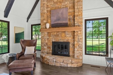 Welcome to this stunning 1.5-story Tudor-style home nestled on on Leawood South Country Club in Kansas - for sale on GolfHomes.com, golf home, golf lot