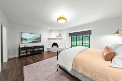 Welcome to this stunning 1.5-story Tudor-style home nestled on on Leawood South Country Club in Kansas - for sale on GolfHomes.com, golf home, golf lot