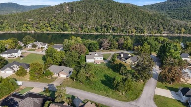 If you've been dreaming of living near the lake with a wide on Holiday Island Executive Golf Course in Arkansas - for sale on GolfHomes.com, golf home, golf lot