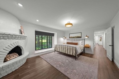 Welcome to this stunning 1.5-story Tudor-style home nestled on on Leawood South Country Club in Kansas - for sale on GolfHomes.com, golf home, golf lot