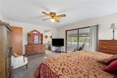 This beautifully maintained home is perfect for the golf lover on Gator Trace Golf and Country Club in Florida - for sale on GolfHomes.com, golf home, golf lot