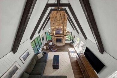 Welcome to this stunning 1.5-story Tudor-style home nestled on on Leawood South Country Club in Kansas - for sale on GolfHomes.com, golf home, golf lot