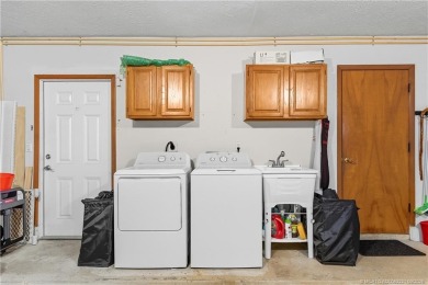 This beautifully maintained home is perfect for the golf lover on Gator Trace Golf and Country Club in Florida - for sale on GolfHomes.com, golf home, golf lot