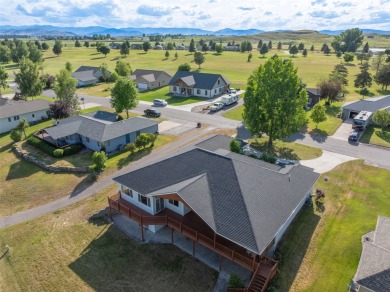 Welcome to 46452 Stagecoach Trail in Ronan, Montana- set against on Mission Mountain Country Club in Montana - for sale on GolfHomes.com, golf home, golf lot