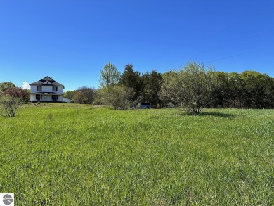 Sweeping views overlooking the 4th hole of the Centennial Farm on The Centennial Farm Golf Club in Michigan - for sale on GolfHomes.com, golf home, golf lot