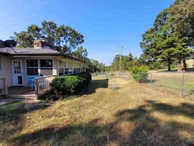 Nestled on two nice lots in the picturesque community of on The Course At Turkey Mountain in Arkansas - for sale on GolfHomes.com, golf home, golf lot