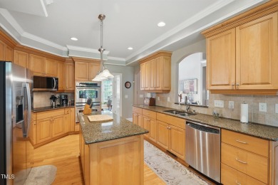 Perfectly positioned on a premium golf course lot overlooking on The Preserve At Jordan Lake Golf Club in North Carolina - for sale on GolfHomes.com, golf home, golf lot