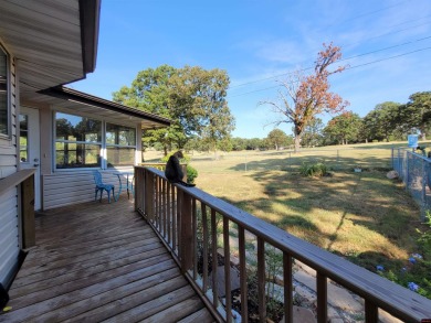 Nestled on two nice lots in the picturesque community of on The Course At Turkey Mountain in Arkansas - for sale on GolfHomes.com, golf home, golf lot