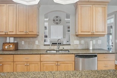 Perfectly positioned on a premium golf course lot overlooking on The Preserve At Jordan Lake Golf Club in North Carolina - for sale on GolfHomes.com, golf home, golf lot