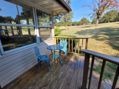 Nestled on two nice lots in the picturesque community of on The Course At Turkey Mountain in Arkansas - for sale on GolfHomes.com, golf home, golf lot