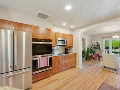 Nestled next to the majestic Colorado National Monument, this on Tiara Rado Golf Course in Colorado - for sale on GolfHomes.com, golf home, golf lot