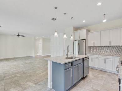 2019 built, this move-in ready home boasts a 3-car garage. The on Sandridge Golf Course and Club in Florida - for sale on GolfHomes.com, golf home, golf lot