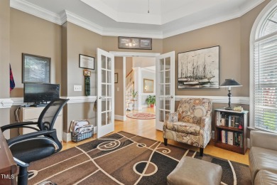 Perfectly positioned on a premium golf course lot overlooking on The Preserve At Jordan Lake Golf Club in North Carolina - for sale on GolfHomes.com, golf home, golf lot