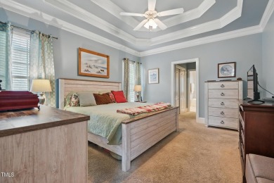 Perfectly positioned on a premium golf course lot overlooking on The Preserve At Jordan Lake Golf Club in North Carolina - for sale on GolfHomes.com, golf home, golf lot