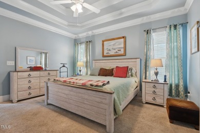 Perfectly positioned on a premium golf course lot overlooking on The Preserve At Jordan Lake Golf Club in North Carolina - for sale on GolfHomes.com, golf home, golf lot