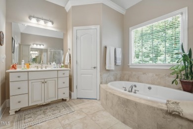 Perfectly positioned on a premium golf course lot overlooking on The Preserve At Jordan Lake Golf Club in North Carolina - for sale on GolfHomes.com, golf home, golf lot