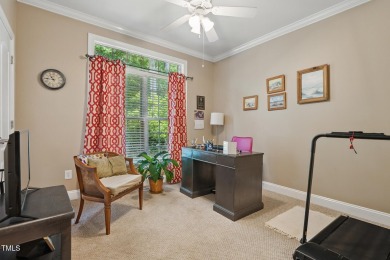 Perfectly positioned on a premium golf course lot overlooking on The Preserve At Jordan Lake Golf Club in North Carolina - for sale on GolfHomes.com, golf home, golf lot