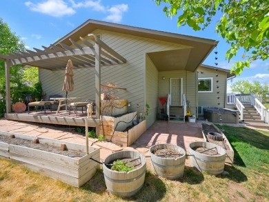 Nestled next to the majestic Colorado National Monument, this on Tiara Rado Golf Course in Colorado - for sale on GolfHomes.com, golf home, golf lot