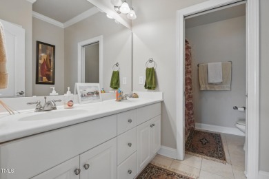 Perfectly positioned on a premium golf course lot overlooking on The Preserve At Jordan Lake Golf Club in North Carolina - for sale on GolfHomes.com, golf home, golf lot