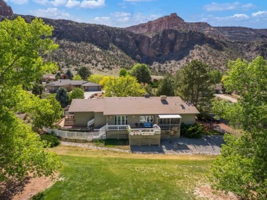 Nestled next to the majestic Colorado National Monument, this on Tiara Rado Golf Course in Colorado - for sale on GolfHomes.com, golf home, golf lot