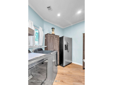 Remodeled 4BR/3BA Lake Home in the gated StillWaters community on Stillwaters Golf and Country Club in Alabama - for sale on GolfHomes.com, golf home, golf lot