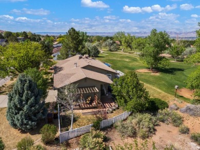 Nestled next to the majestic Colorado National Monument, this on Tiara Rado Golf Course in Colorado - for sale on GolfHomes.com, golf home, golf lot