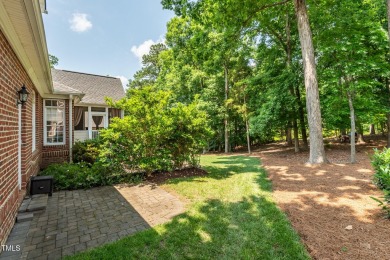 Perfectly positioned on a premium golf course lot overlooking on The Preserve At Jordan Lake Golf Club in North Carolina - for sale on GolfHomes.com, golf home, golf lot