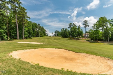 Perfectly positioned on a premium golf course lot overlooking on The Preserve At Jordan Lake Golf Club in North Carolina - for sale on GolfHomes.com, golf home, golf lot