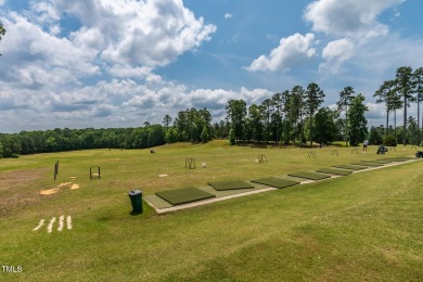 Perfectly positioned on a premium golf course lot overlooking on The Preserve At Jordan Lake Golf Club in North Carolina - for sale on GolfHomes.com, golf home, golf lot