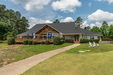 Perfectly positioned on a premium golf course lot overlooking on The Preserve At Jordan Lake Golf Club in North Carolina - for sale on GolfHomes.com, golf home, golf lot