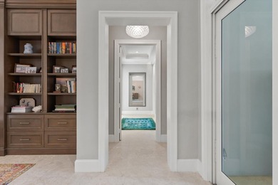 This exceptional 3-bedroom, 3.5-bath home situated on just under on The Loxahatchee Club in Florida - for sale on GolfHomes.com, golf home, golf lot