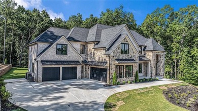 Set on a private 2.3-acre creek-lined homesite in the on Echelon Golf Club in Georgia - for sale on GolfHomes.com, golf home, golf lot