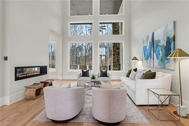 Set on a private 2.3-acre creek-lined homesite in the on Echelon Golf Club in Georgia - for sale on GolfHomes.com, golf home, golf lot