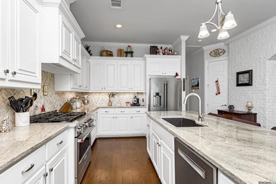 Discover the expert architecture and luxurious, move-in-ready on Pelican Point Golf Club in Louisiana - for sale on GolfHomes.com, golf home, golf lot